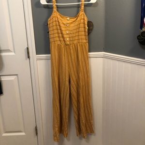 A yellow striped jumpsuit